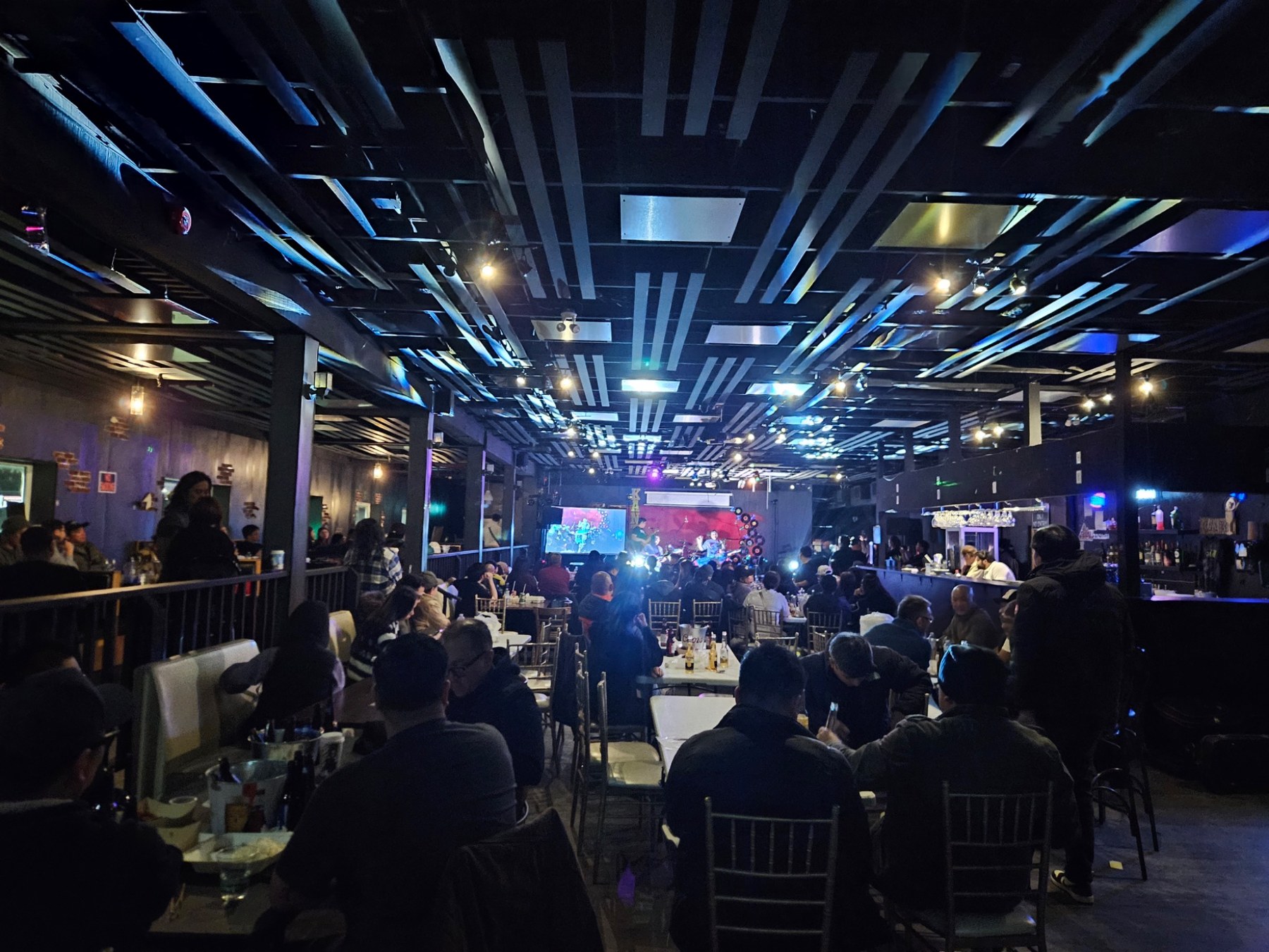 Birthday event with stage lighting and audience